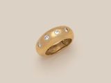 a gold and diamond ring