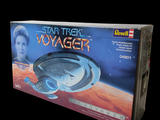 a box with a model of a star trek voyager on it