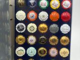 une photo d'une boîte contenant toutes sortes de capsules de bière