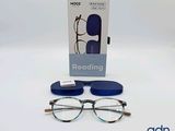 une boîte de lunettes de lecture et une paire de lunettes sur la table