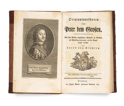 an old book with a picture of a man in a suit on it