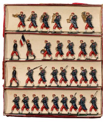 un vieux livre orné d'une multitude de figurines de soldats