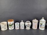 six different types of tea and coffee mugs lined up on a table
