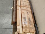 a stack of boxes on a pallet in a warehouse