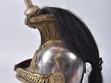 a helmet with a long hair on top of it
