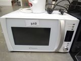 a microwave that is sitting on top of a table