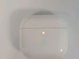 an image of a wall mounted airpods on a white wall
