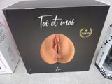 a black box with a picture of a woman ' s face on it