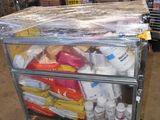 a cart that has a lot of items in it