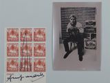 an old photo of a man sitting on a chair next to a stamp