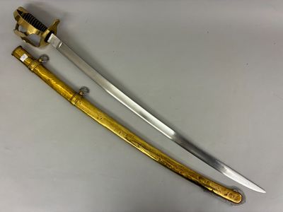 a close up of two swords on a white surface