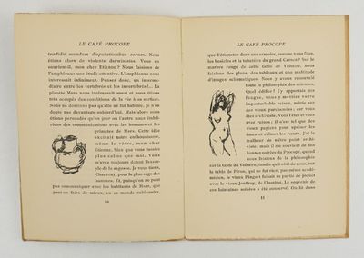 an open book with a drawing of a dog and a cat on it