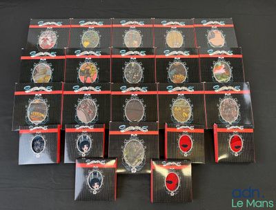 a lot of badges on a black table
