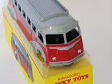 a toy bus that is sitting on top of a box