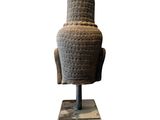an image of a statue of a man sitting on top of a table