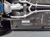 a close up view of a car ' s engine and suspensions