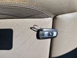 a car key attached to the back seat of a car