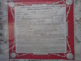 a poster on the wall of a building with a red border