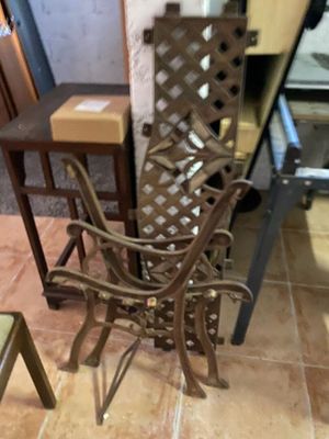a chair that is sitting on the floor in front of a table