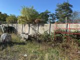 a fence that is next to a wall that has been fenced off