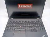 lenovo laptop with a red lenovo sticker on the screen