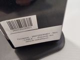 a black box with a barcode on it sitting on a table