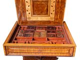 an image of a wooden box that is open and sitting on top of a table