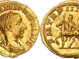 a gold coin with an image of a man on a horse