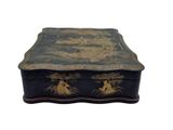 a black box with gold decorations on it