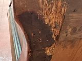 a dirty kitchen counter that has been cleaned and rusted