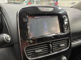 a car dashboard with a digital device in it