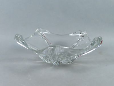 clear glass bowl on a white table with a white background