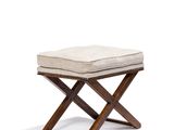 an image of a small stool with a cushion on it