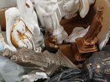 a box full of figurines sitting on a table