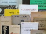 many books that are on the table together