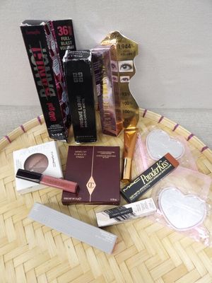 a wicker tray with various beauty products on it