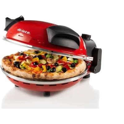 a pizza that is being cooked on a grill