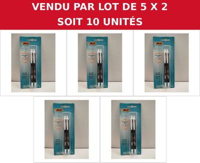 six toothbrushes in a row with different packagings on a table