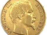 une image montrant un gros plan d'une pièce d'or sur laquelle figure le visage d'un homme