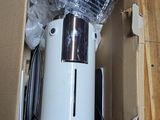 a box with a blender inside of it on a wooden floor