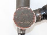 a close up of a metal pipe with a hole in it