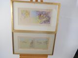two framed pictures of birds on a easel next to each other