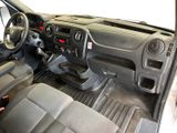 a view of the inside of a car with the dashboard and steering controls