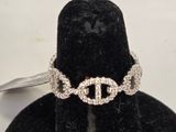 an image of a diamond ring on a black hat