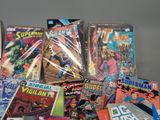 a lot of comic books that are on the table