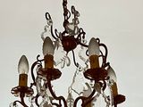 a chandelier hanging from the ceiling in a room