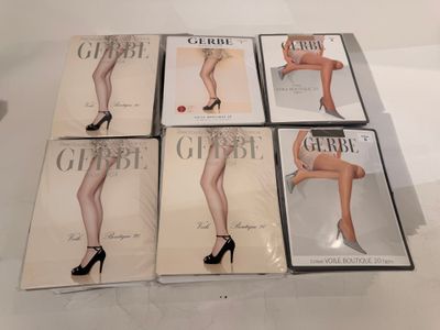 six dvds of a woman ' s legs in stockings and high heels