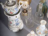 many different vases that are sitting on a table