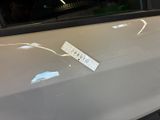 a sticker on the door of a white car