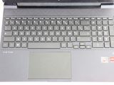 a close up of a laptop computer on a white surface